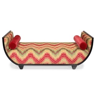 Ducreaux — curved bench with flame-stitch upholstery and red bolsters