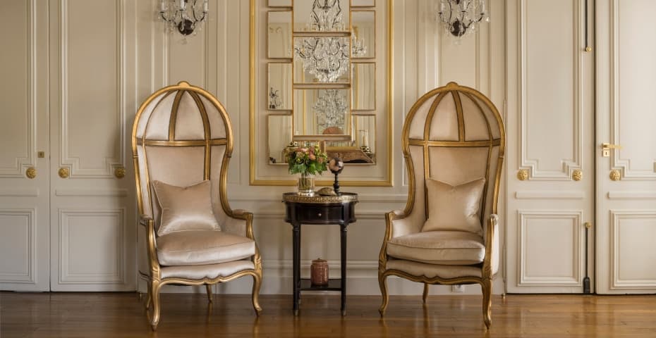 French armchair in a classic Parisian setting near the Seine